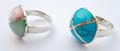 Sterling silver ring with full moon shape design with X pattern embedded assorted mother of seashell or turquoise
