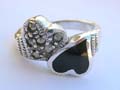Sterling silver ring with multi marcasites embedded in heart shape and another heart shape in onyx gemstone