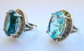 Sterling silver ring with oval blue/green cz stone set in middle with multi rounded marcasites around, randomly pick 