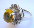 Multi marcasites beaded in cut-out flower shape design sterling silver ring with a oval yellow cz stone in middle