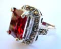 Sterling silver ring with red/blue rectangular cz stone in the center and multi marcasites around, assorted randomly pick