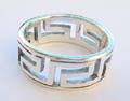 Carved-out puzzle pattern design sterling silver ring