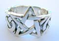 Celtic sterling silver ring with woven band design and pentagram in the middle