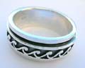 Black sterling silver ring with wavy pattern around