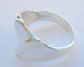 Sterling silver ring with flat wide plain irregular shape pattern