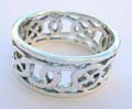 Wide ring with woven celtic design motif sterling silver