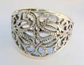 Sterling silver ring with filigree flower pattern 