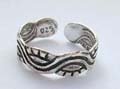 Sterling silver toe ring with carved-in sun and mountain pattern decor around