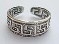 Black sterling silver toering with carved-out dot and puzzle pattern decor 