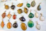 Assorted 
          tiger-eye, green onyx, amber, labradorite, moon , lapis gemstone sterling 
          silver pendant, randomly picked by warehouse staffs 