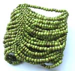 Green rainbow seed beaded bracelet forming in wide band design 