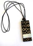 Genius black cord necklace with long rectangular shape carved in multi circle design