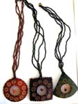 Assorted beaded necklace with assorted coconut wooden shape design and spider wed motif in center