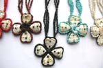 Mini multi beaded necklace and pendant with shell embedded on imitation leather back, coconut bottom end design