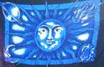 Dark blue sarong wrap motif a large sun and planet, moon, fire decor on each edge