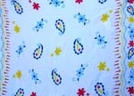 Batik white rayon sarong motif yellow, blue and red pattern and blue water-drop design