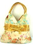 Golden Chinese silk tote double handle purse with floral scene design and gold 