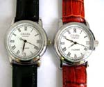 Casual apparel wrist kinetic watch(no battery need) with red or black band holding a round clock framed with silver plating