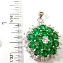 Multi dark green and clear round cz forming a flower pendant and clear star shape cz inlaid in the center 