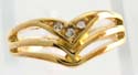 Gold ring motif twisted arrow shape pattern embedded clear cz and triple wave line design on each side