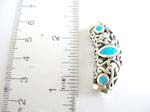 Sterling silver long cylinder with filigree pattern design embedded turquoise