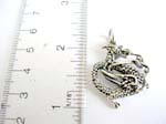 Stamped 925.sterling silver dragon pendant in curvy movement 