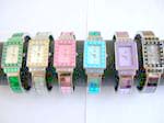 Rectangular mini flower inlaid around with assorted color face and multi sparkle chips on bangle