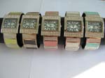Wide rectangular cobblestone bangle watch with shimmers clock face design in assorted color
