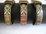 Bronze and copper color long rectangular color with indan lady facial on bangle