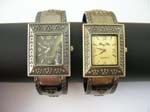 Rectangular bangle wrist watch with mullti crowns pattern design in black and yellow color design