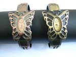 Copper and shiny brown color cuff wrist watch motif in butterfly clock face