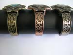 Bronze, copper, shiny black cuff bangle fashion watch with diamond shape design and carved-in pattern on bangle
