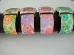 Printed color fashion bangle watch with square shape clock face with rainbow color floral design