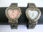 Fashion heart shape bangle watch with assorted mother of pearl dial and filigree pattern on bangle