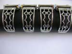 Fashion cuff watch motif in wide rectangular shape with clear cz inlaid on each side and wavy pattern design on bangle