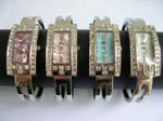 Long rectangular fashion bangle watch with clear cz inlaid and a shimmering assorted color mother of pearl dial design