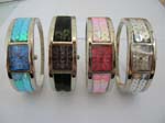 Fashion cuff bangle watch with rectangular assorted color clock face and sequins on bangle design