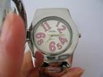 Spinning flip top bangle watch with star pattern