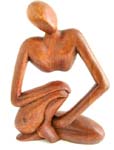 Yogi man in yoga sitting position band its body and holding both hand on knees