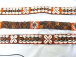 Assorted orange color seed beads and seashell and coconut wooden button belt from Bali with two strings tie design