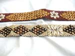 Assorted design brown color seed beads and seashell and coconut wooden button belt with two strings for closure