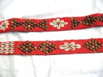 Assorted design in red color seed beads and seashell and coconut wooden button belt with two strings for closure