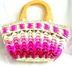 Multi pink straw hand bag with double wooden handle, zipper closure and inner pocket design 