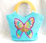 Blue canvas fabric with sequins wooden handle hand bag motif butterfly feature in sparkle chips and thread work design with zipper closure and inner zipper pocket 