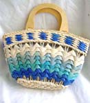 Multi blue straw hand bag with wooden handle, zipper closure and inner pocket design 