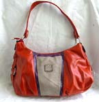 Mesh imitation orange leather hand bag with single shoulder design and inner zipper pocket and zipper pocket on back