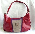 Mesh imitation red leather hand bag with single shoulder design and inner zipper pocket and zipper pocket on back