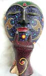 Batik dotted painting lady face mask stand with thinking motion and pray motion design