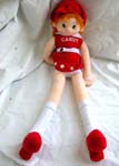 Cutie girl toy with red hat, red dress and red shoes 