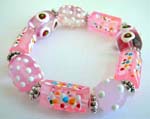 Fashion stretchy pink bracelet with multi red white hand-painted Chinese lampwork glass bead and flat silver beads design